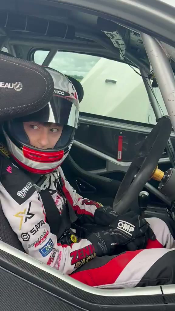 Zak looking up from the Corbeau race seat