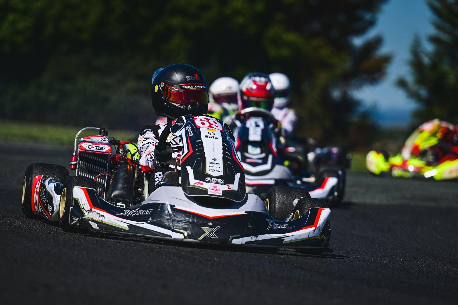 Zak leading a pack of karts