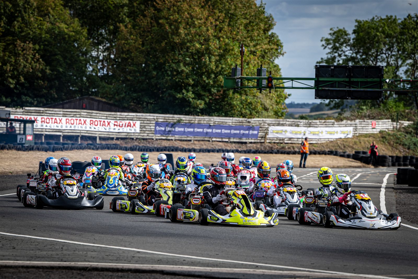 The Super One Junior grid streaming into the first corner at Shenington in 2026